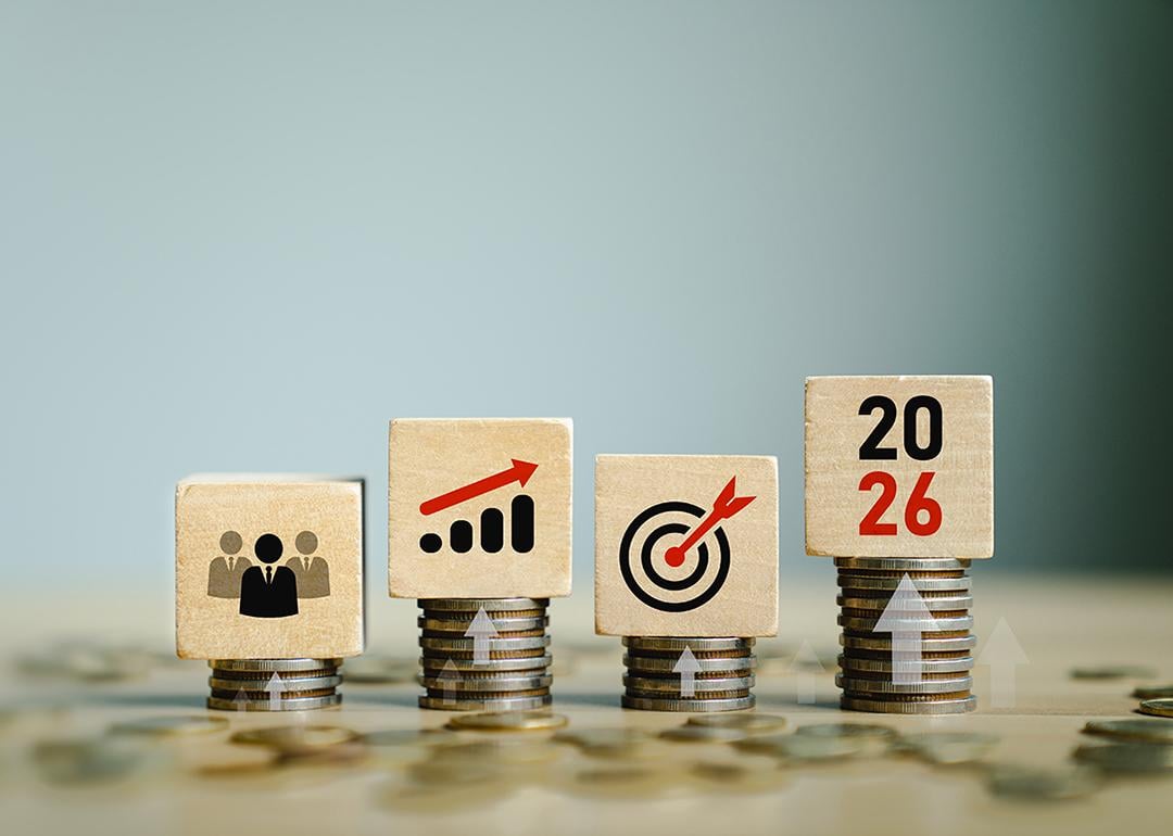 Wooden blockes with team forecast and 2026 growth goals graphics as a concept of economic forecast.