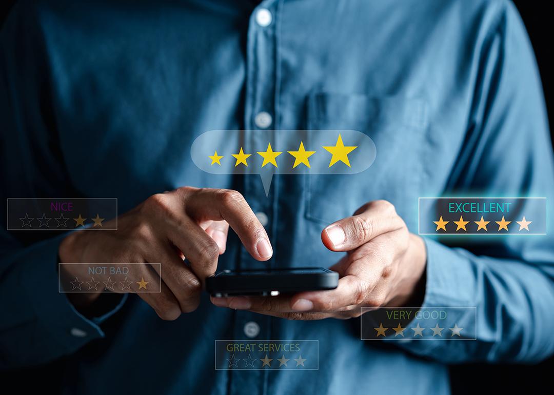Man using a phone illustrated with graphics depicting rating customer service online.