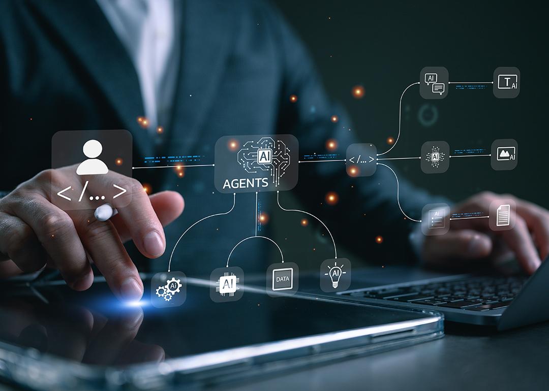 Agentic AI workflow graphics over a businessman using a laptop and tablet for productivity.