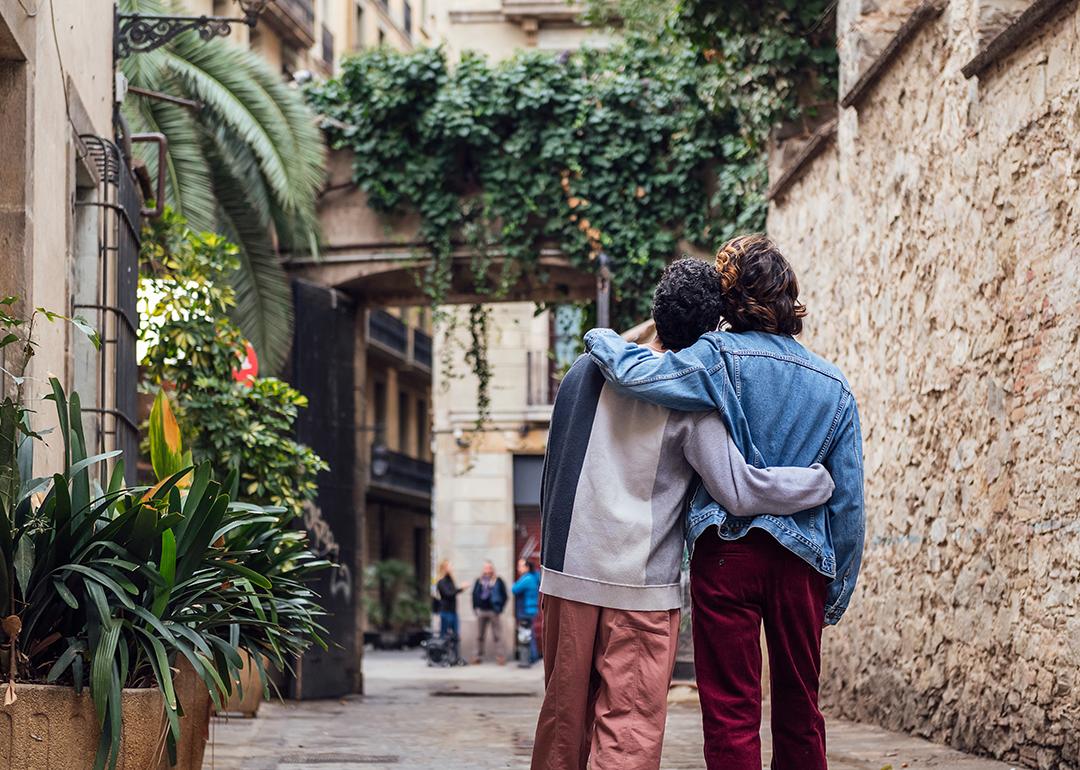 A male couple looking at a sight during a trip.
