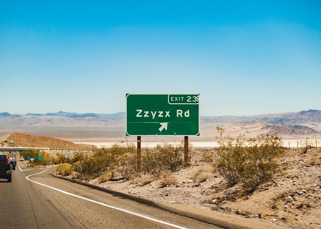 Zzyzx Rd sign at Interstate 15 freeway from Los Angeles, California to Las Vegas, Nevada in USA.