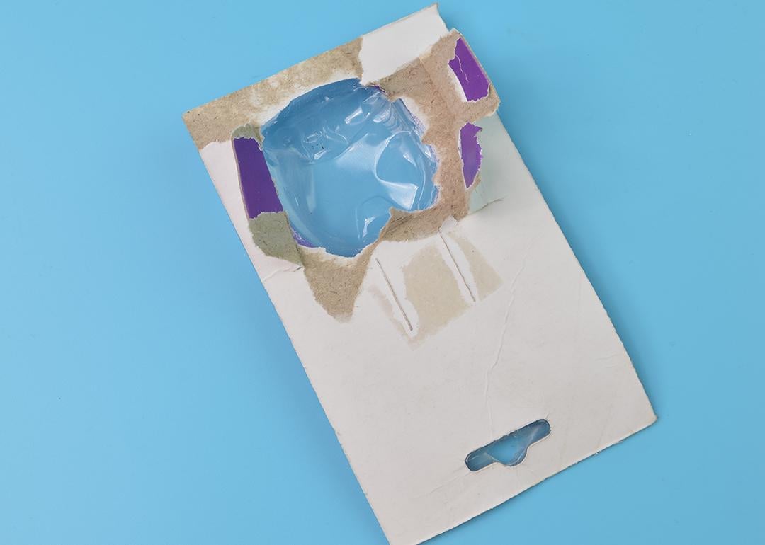 A torn cardboard and plastic packaging.