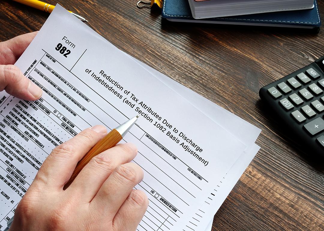 Person reviewing to sign a Form 982.