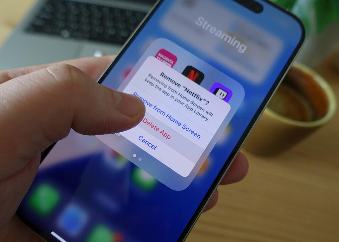 A user prompting to delete Netflix app from his smartphone's screen.