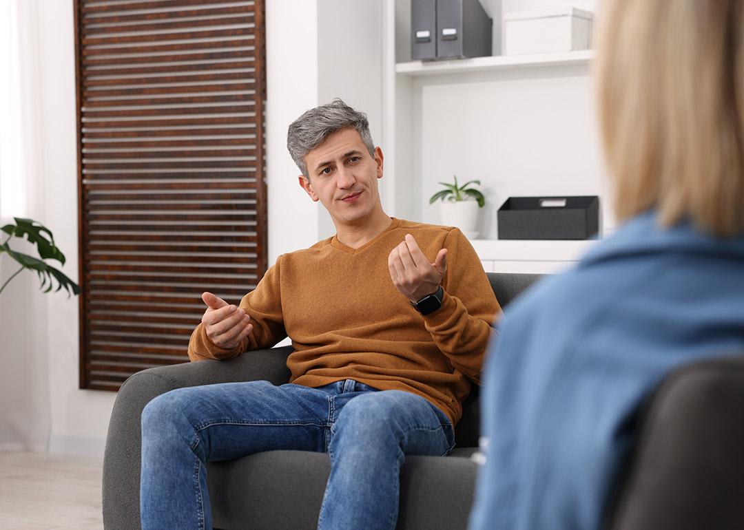 A professional psychologist during a session with a patient in a clinic.