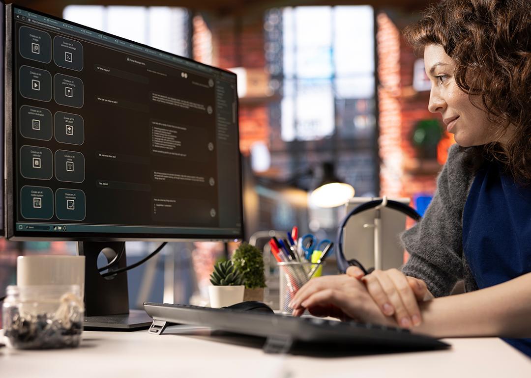 A female employee navigating an AI chatbot system for work.