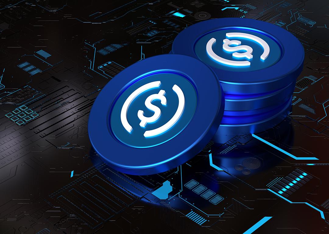 A 3D rendering of a stack of stablecoins on top of a computer circuit system.