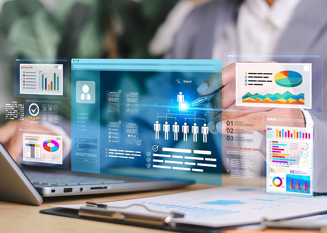 A digital marketing dashboard with informational charts and performance data being utilized by a marketer.