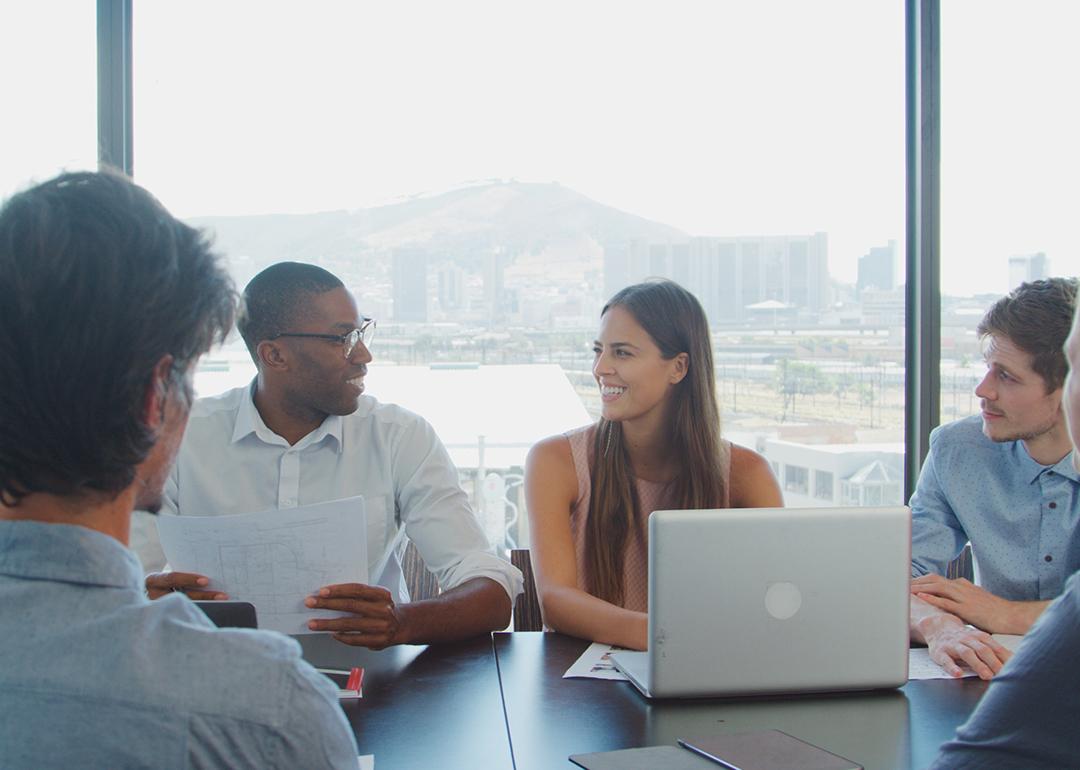 A business team in a boardroom together.