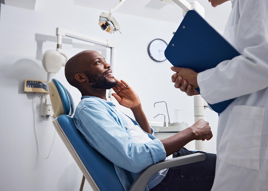 A relieved patient at the dentist during an appointment.