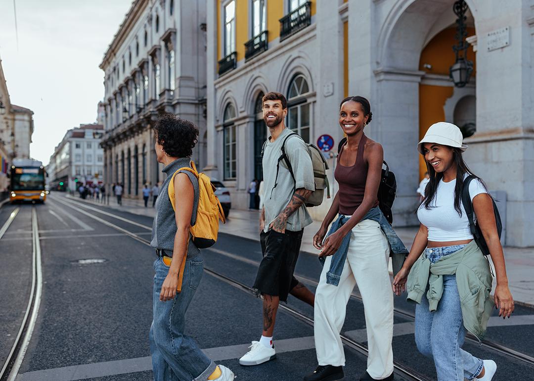 A group of friends checking out the streets of a city.
