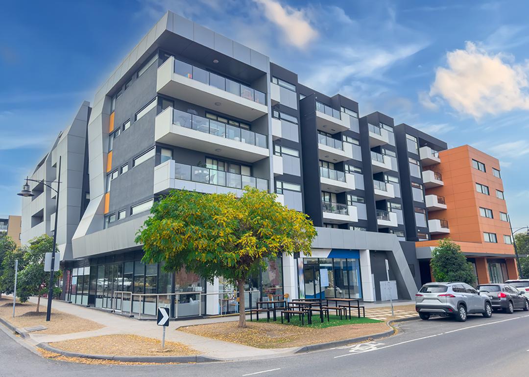 A multi-story residential apartment building situated in Melbourne, Australia.