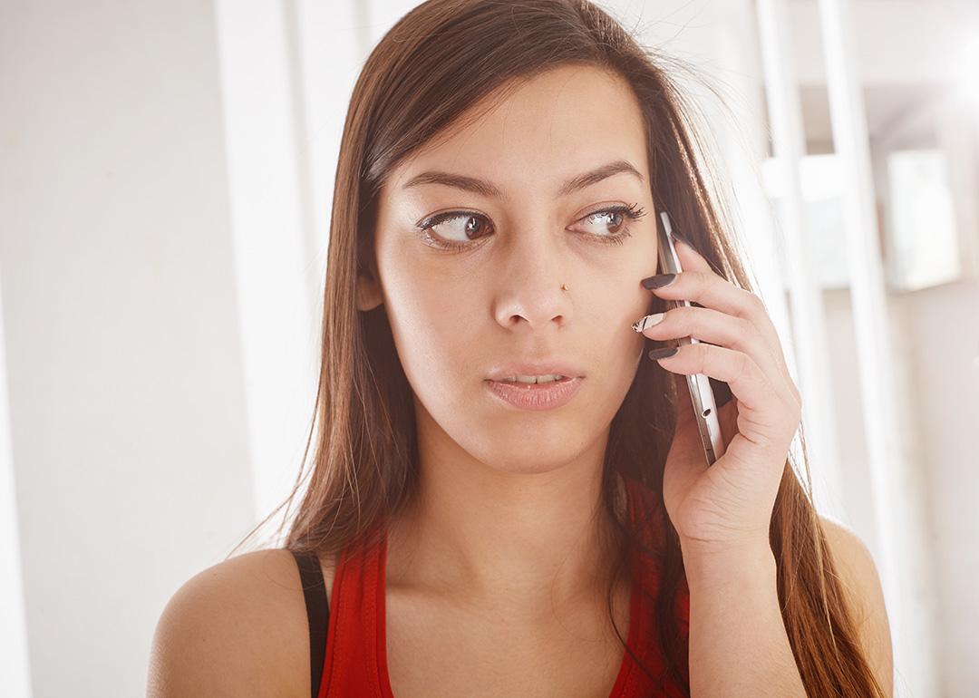A person talking to someone over her smartphone. 
