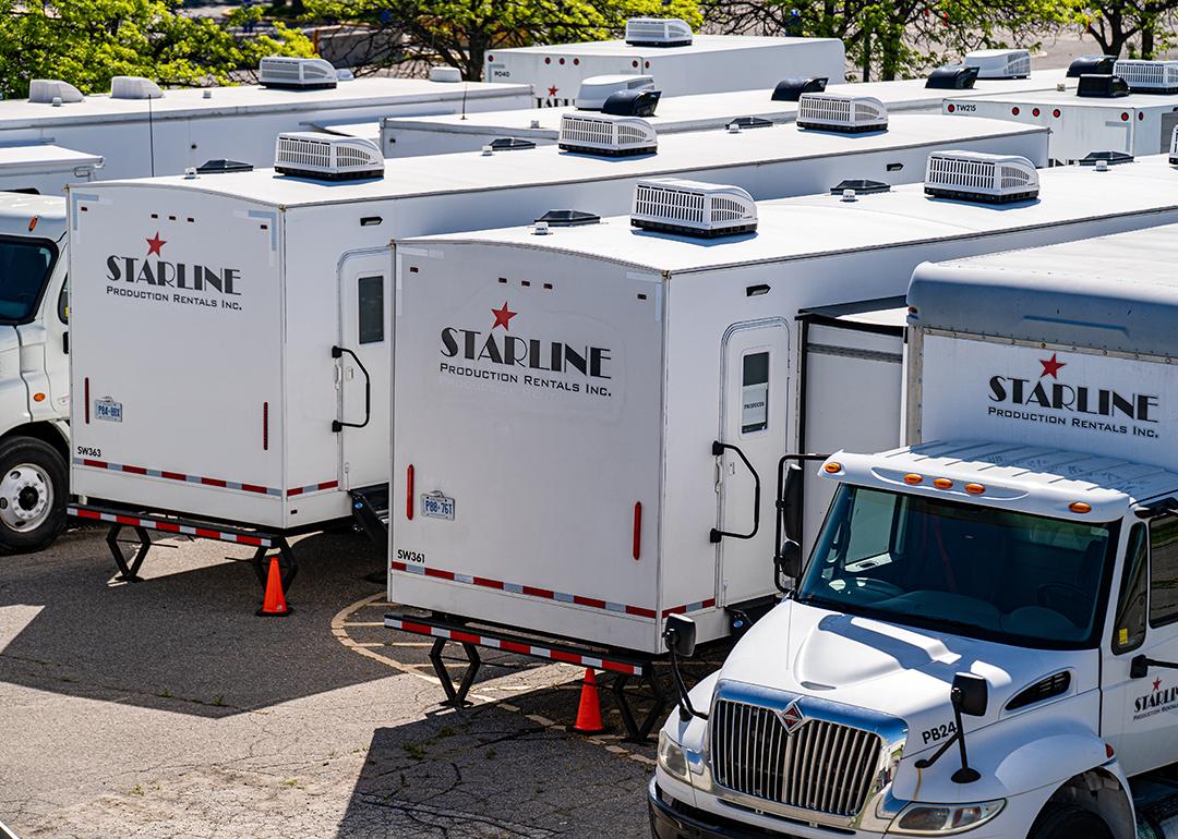 A view of Starline Production rental trucks and trailers.
