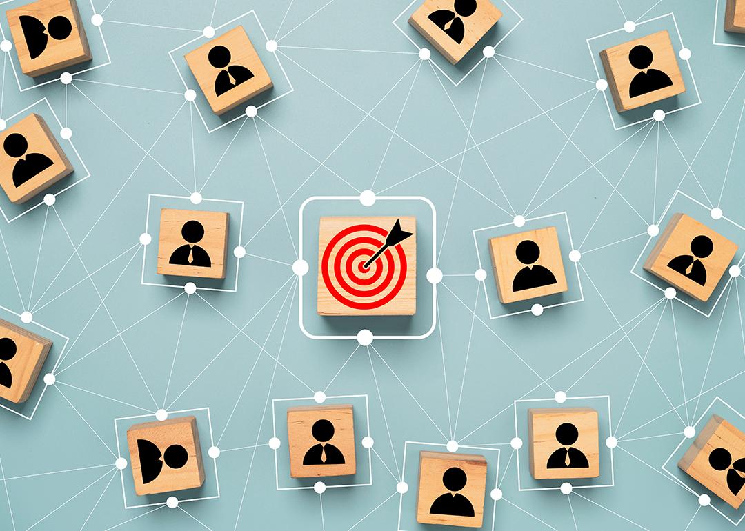 A red dartboard with human customer icons surrounding its connective map as a concept of customer target troup.