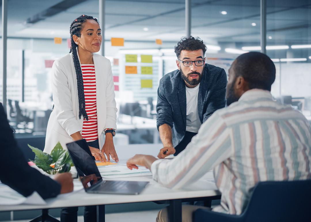 A diverse business group having a meeting in a modern office.