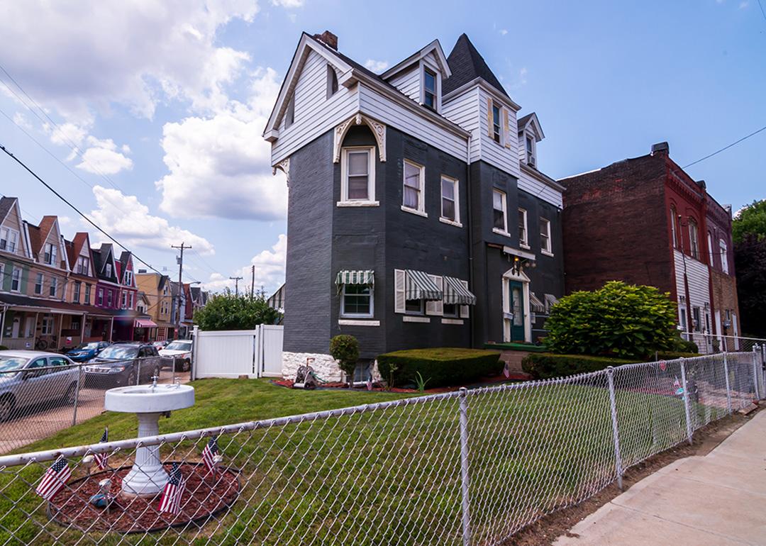 A three-story house built in 1929 and seen along Dawson Street in the south Oakland neighborhood in Pittsburgh, Pennsylvania, USA.