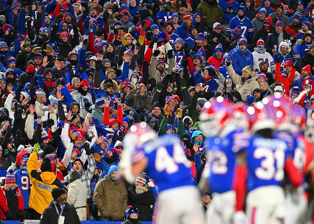 Buffalo Bills fans celebrating through an audience wave during the third quarter game against the New York Jets at Highmark Stadium in New York, USA.