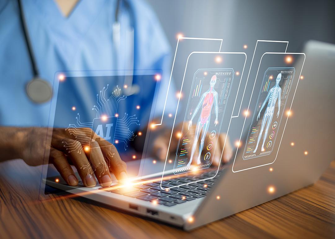 A doctor using AI technology for a patient's diagnosis on a computer system. 