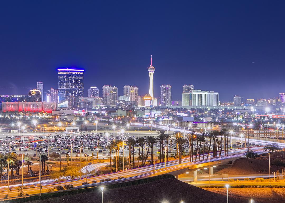 A view of the Las Vegas skyline as seen from Harry Reid Airport at night.