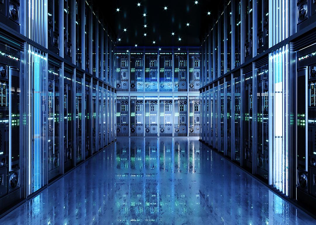 Interior of a data center showing a hall of server packs.