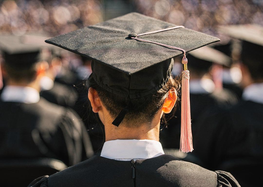 A back view of a university graduate during their ceremony.