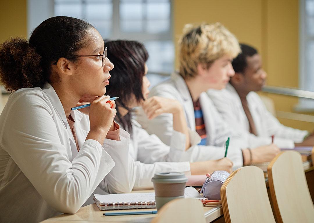 Medical students listening to a lecture at a university.