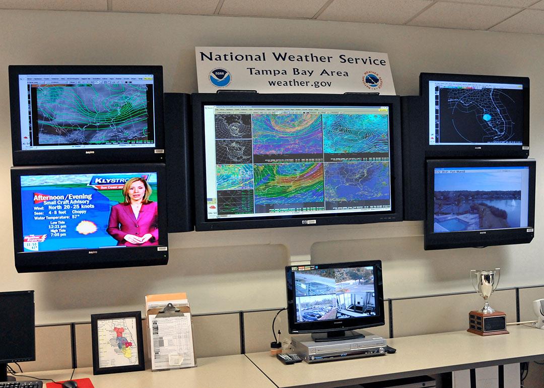 A meteorologist's work station monitoring hurricane alerts in Florida.