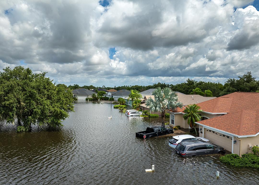 Homes, cars, and roads submerged in floods from a recent typhoon that affected the area. 