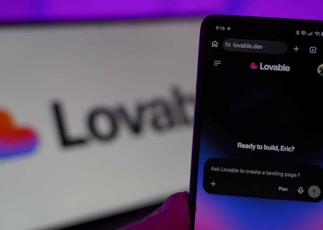 The Lovable AI app with a background of their logo.