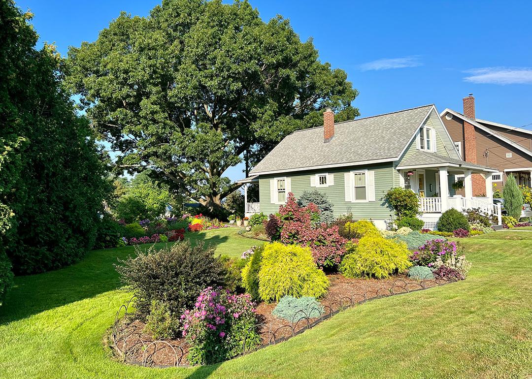 A home with a beautifully manicured lawn.