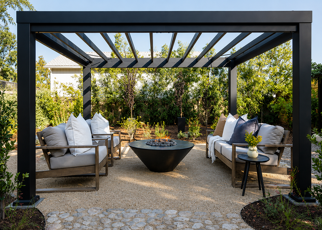 A modern black aluminum pergola structure with a contemporary outdoor lounge area.
