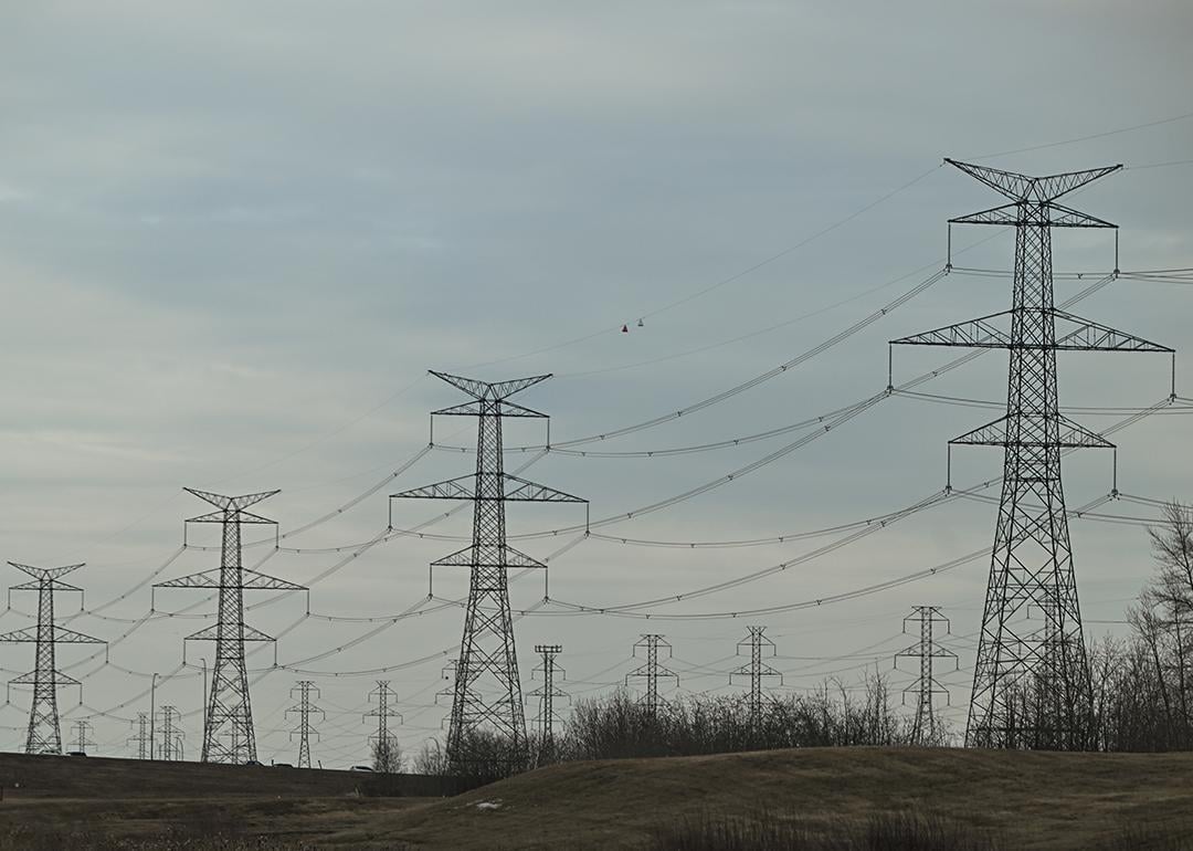 Electric poles and power lines seen in South-East area of Edmonton, Alberta, Canada.