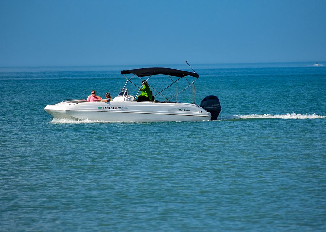 People enjoying bowrider boat ride in the Clearwater Beach in Florida, USA.