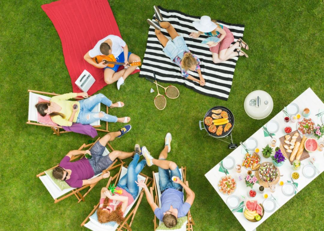 People sitting on a lawn.