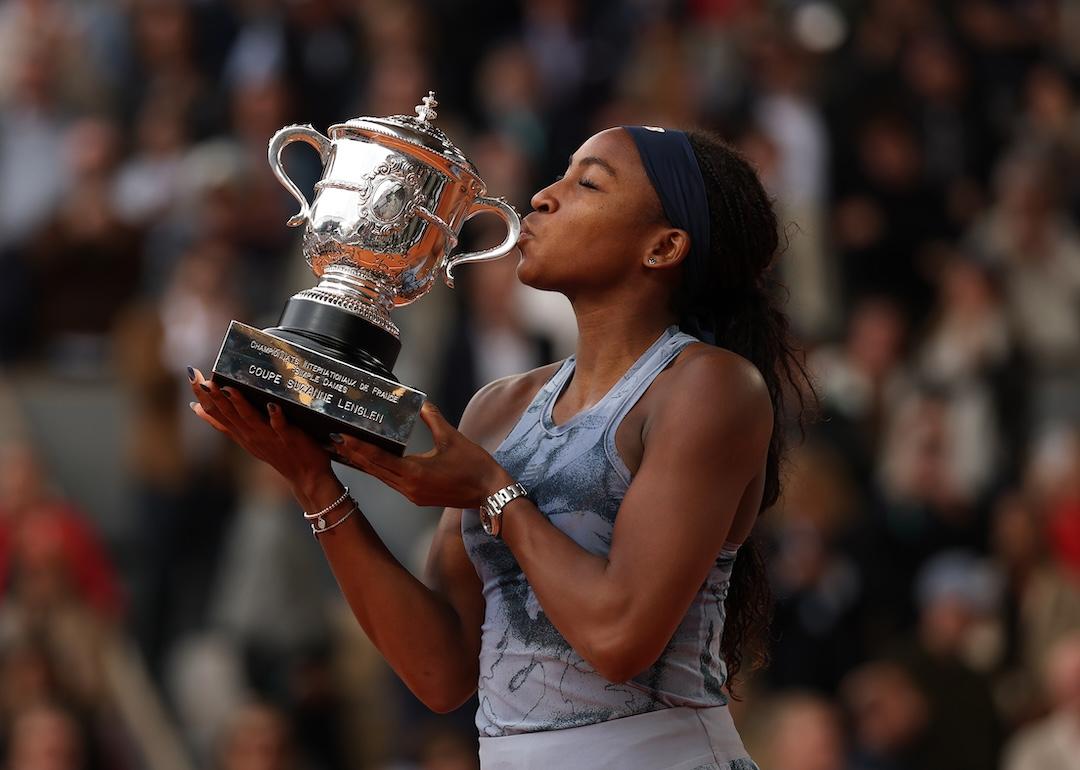 Coco Gauff lifting her 2025 French Open trophy