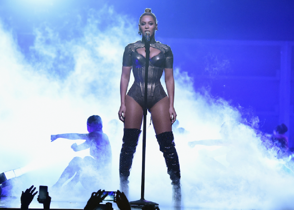 Beyoncé performing onstage.