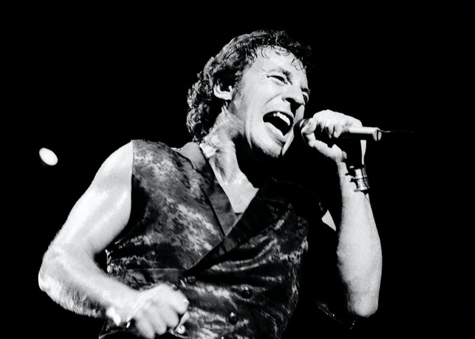 Bruce Springsteen performs onstage.
