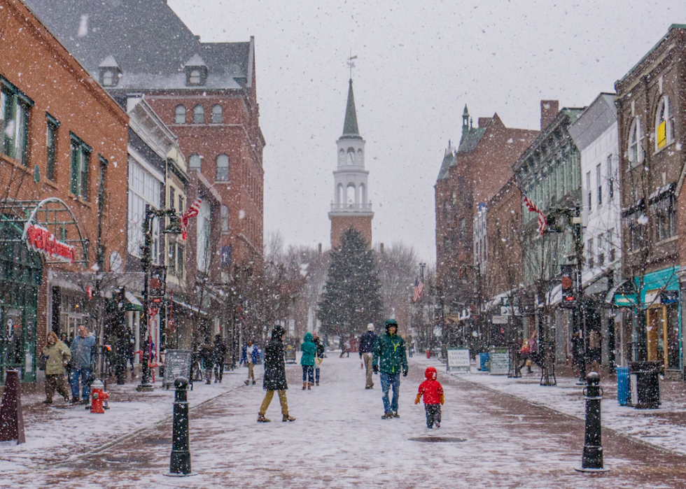 Snowy scene on Church Street decorated for Christmas.