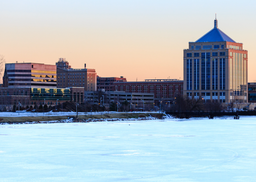 Buildings and a frozen lake.