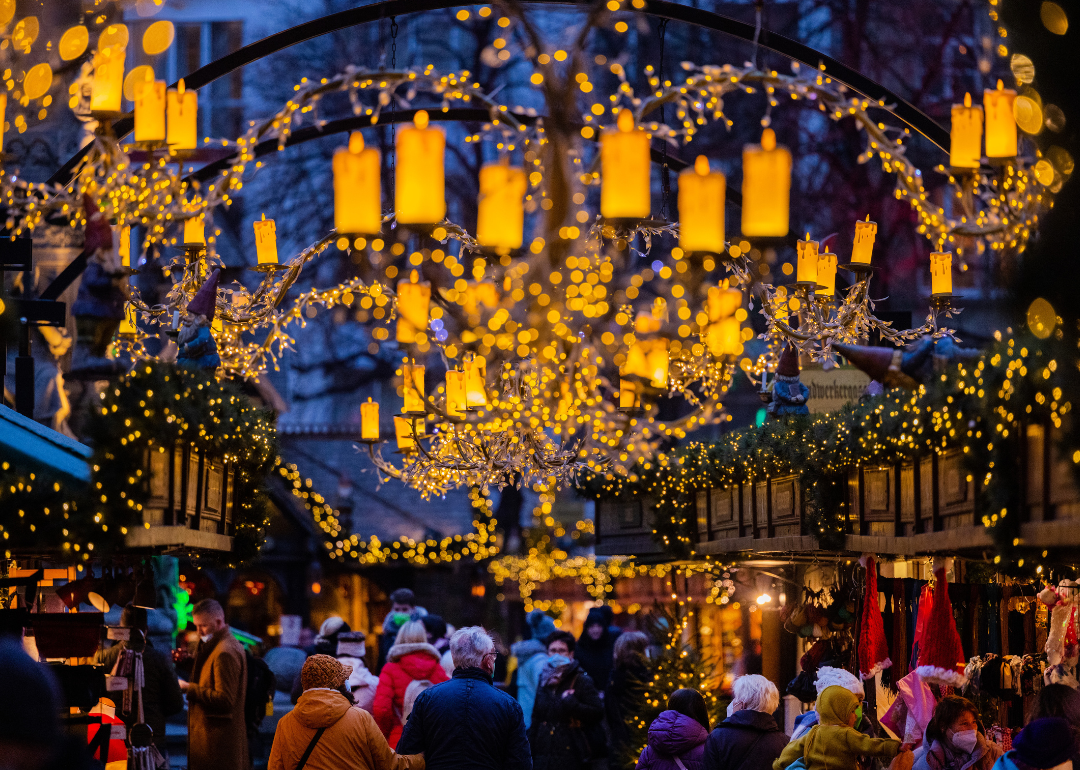 Visitors walk through the Christmas market in Cologne.