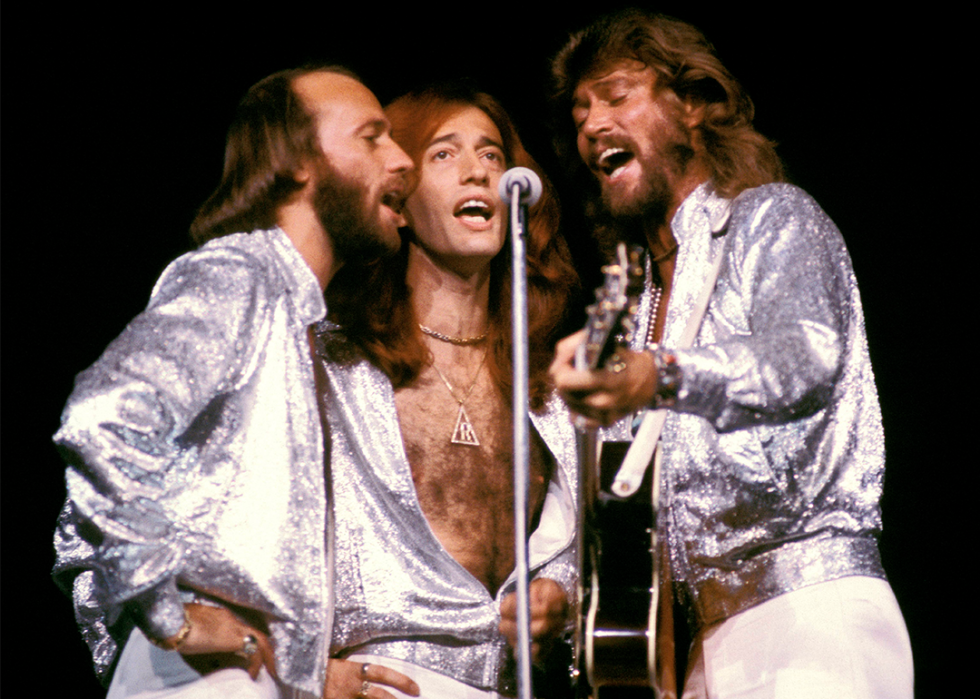 The Bee Gees performing on stage at Madison Square Garden.