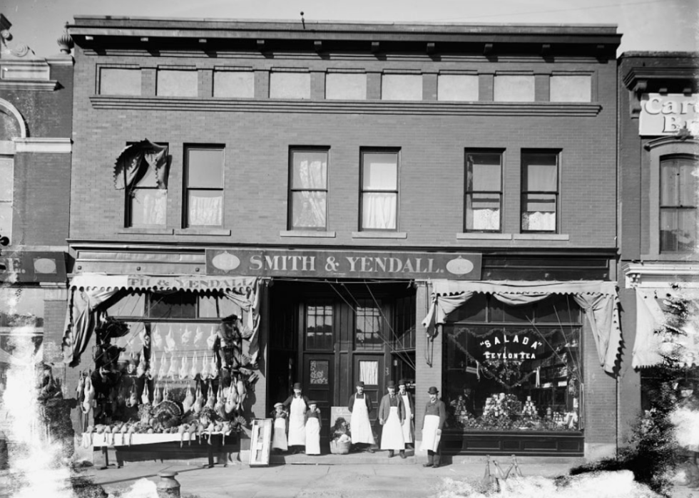 People standing in front of a General Store