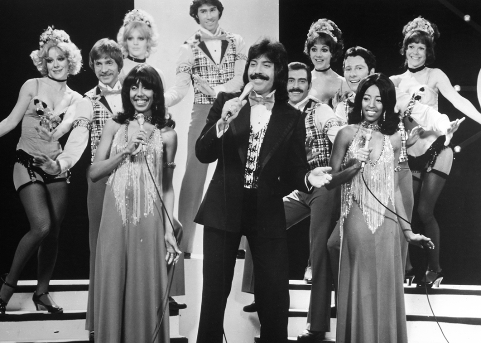 Tony Orlando and Dawn performing on stage.