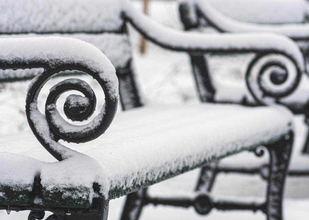 Snow covered bench close up