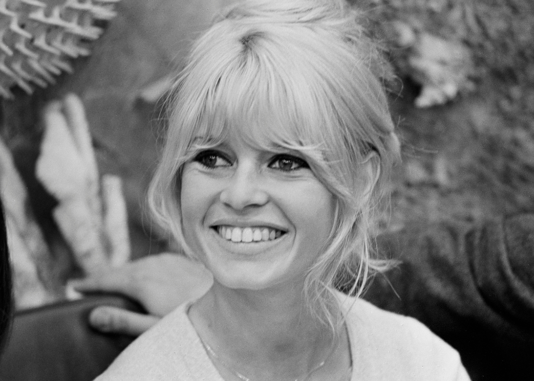 Brigitte Bardot smiles.