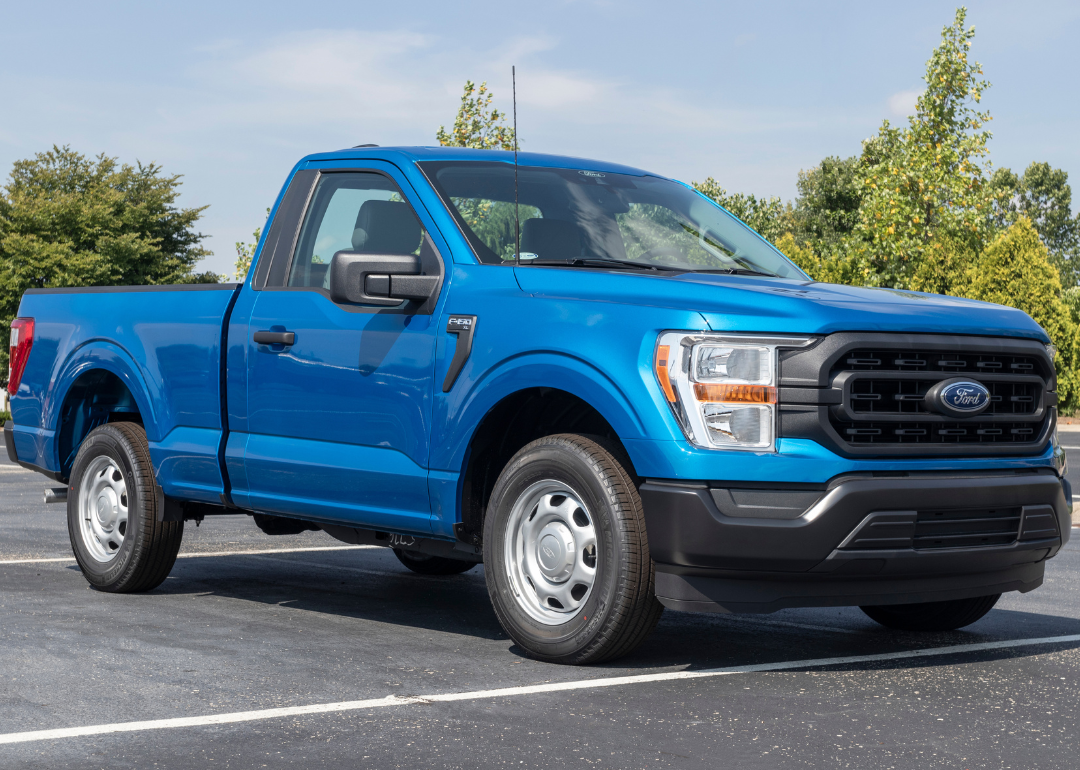 Blue Ford F-150 in parking lot