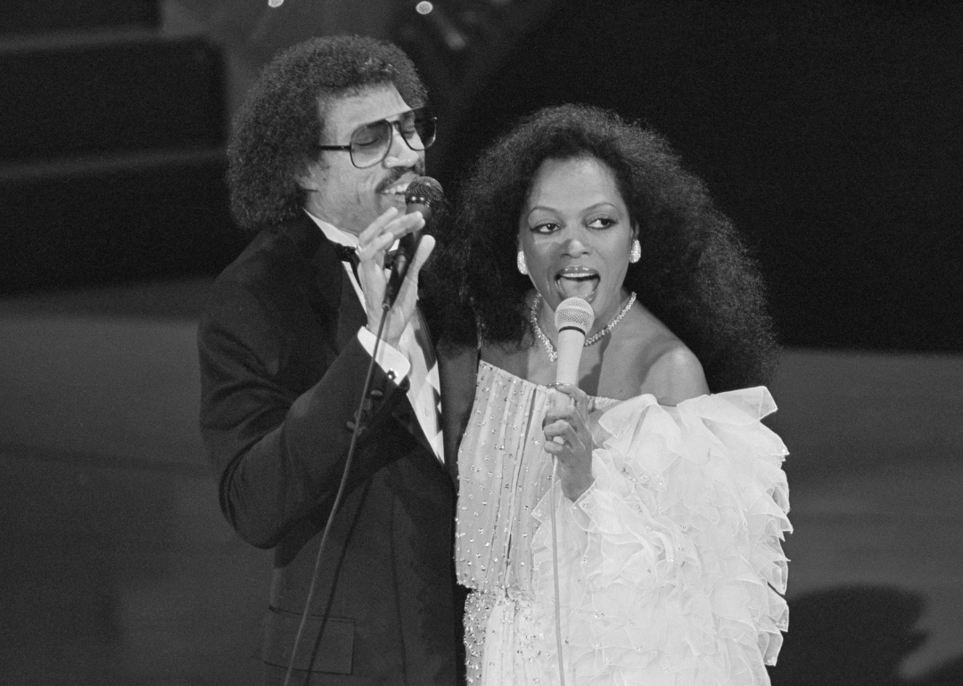 Lionel Richie and Diana Ross perform onstage.