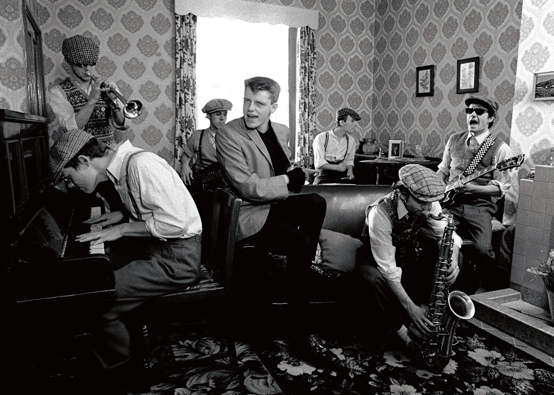 Madness pose during the filming of video to their single 'Our House’.