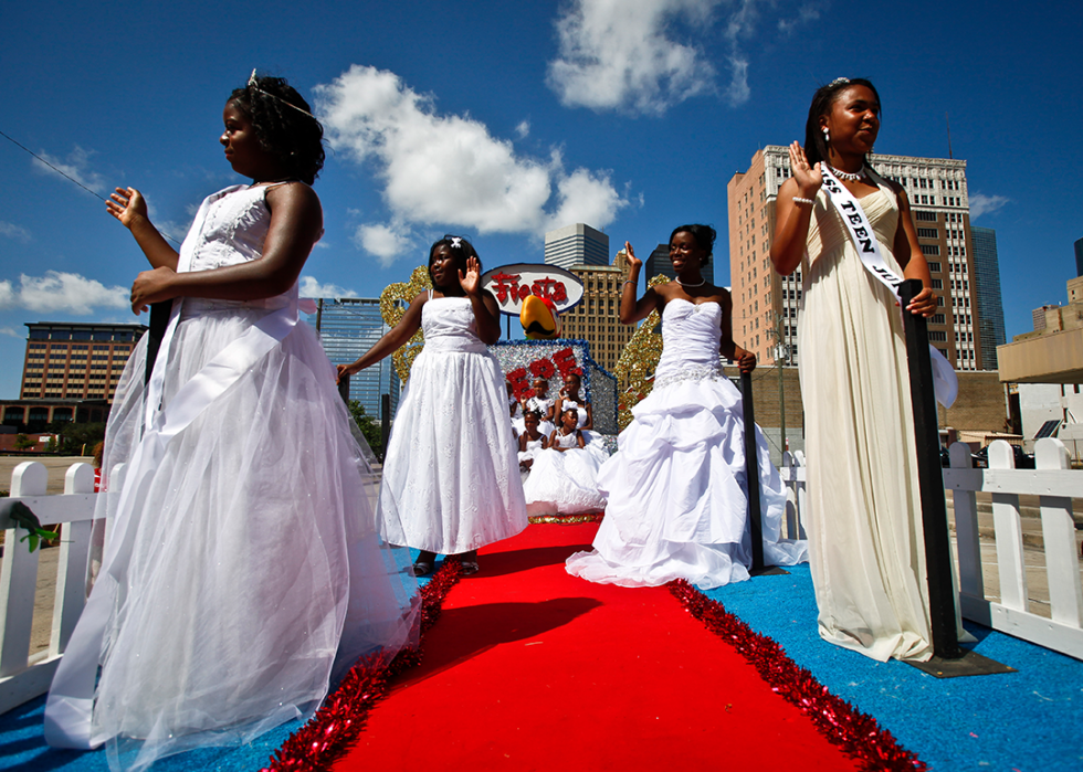 Miss Juneteenth Pageant Winners wave to the crowd in Houston.